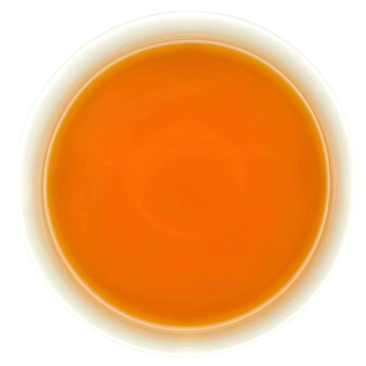 a close up of the golden-orange da hong pao liquor