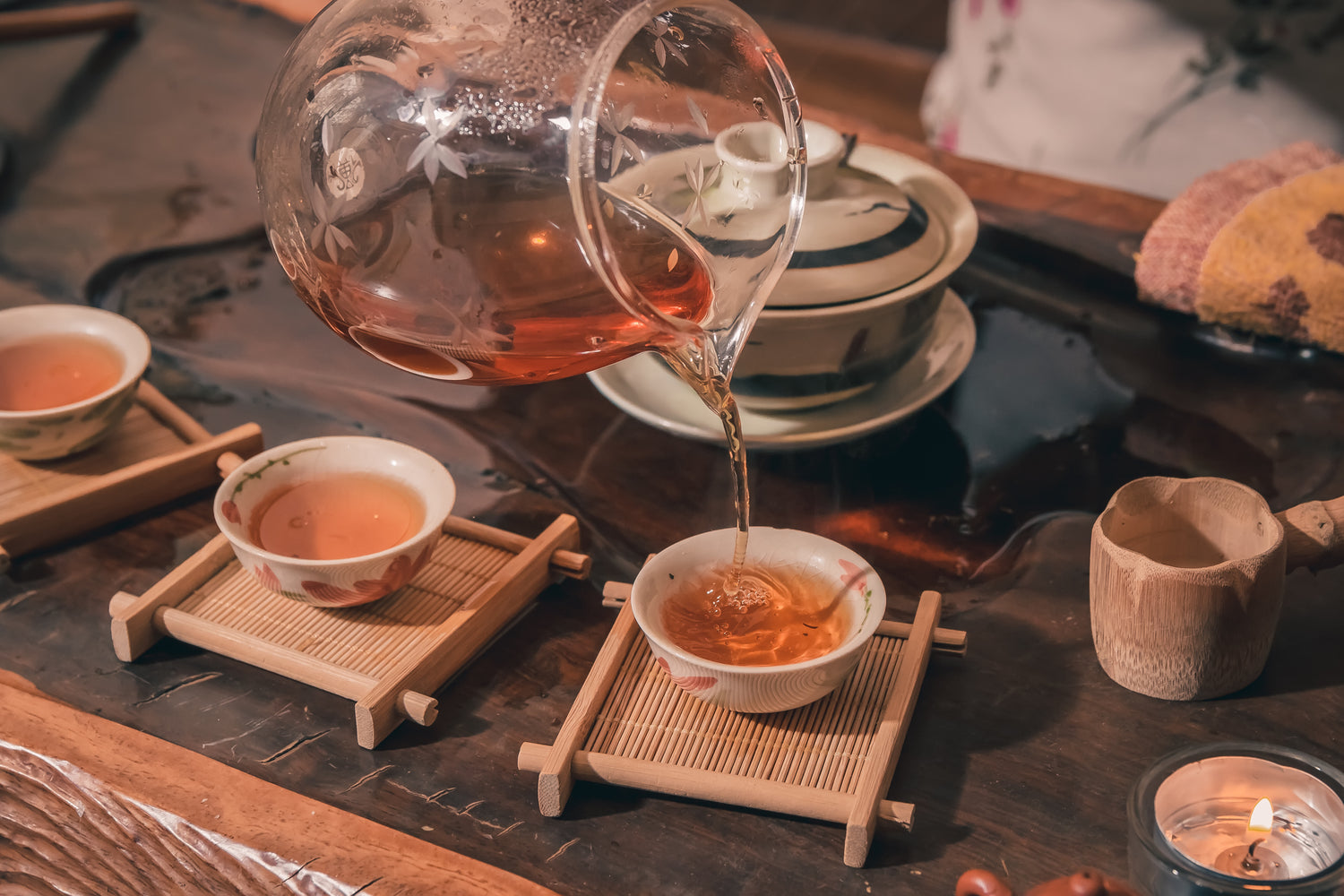 3 cups of imperial red robe (da hong pao) tea being served traditional style